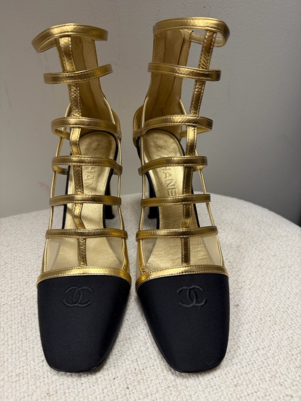 CHANEL Gold Multi-Strap Pumps with Black Cap Toe